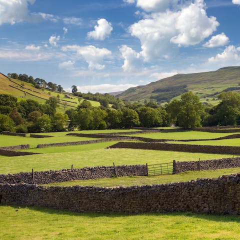 Take a hike in the Yorkshire Dales National Park, a twenty-minute drive away