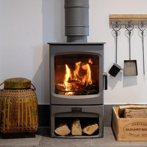 Warm your toes by the wood burner after a long country walk
