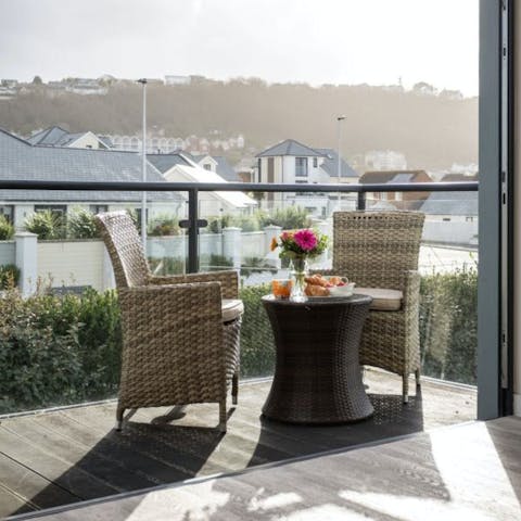 Sip your morning juice on the sun-kissed private balcony