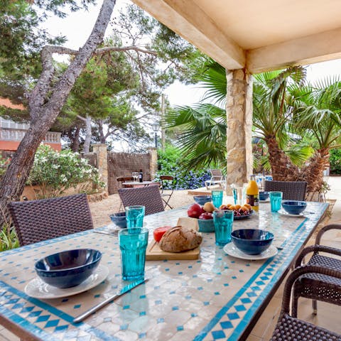 Serve up Mallorcan delicacies at the alfresco dining table