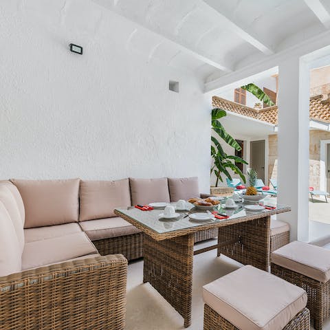 Enjoy alfresco dining on the poolside terrace