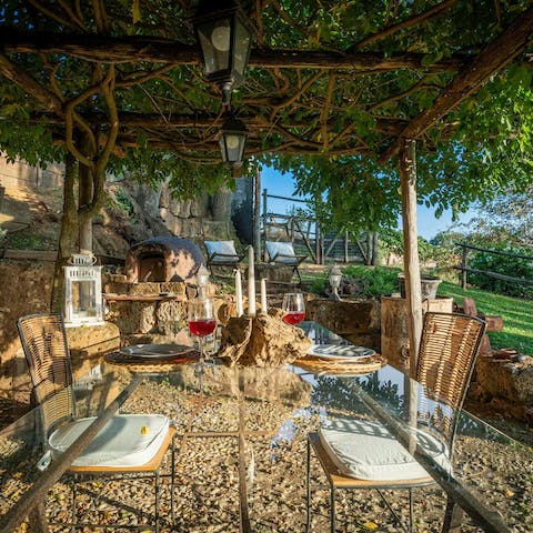 Unwind with a glass of local wine in the shade of the veranda
