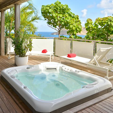 Sink into the hot tub on the terrace for a relaxing soak