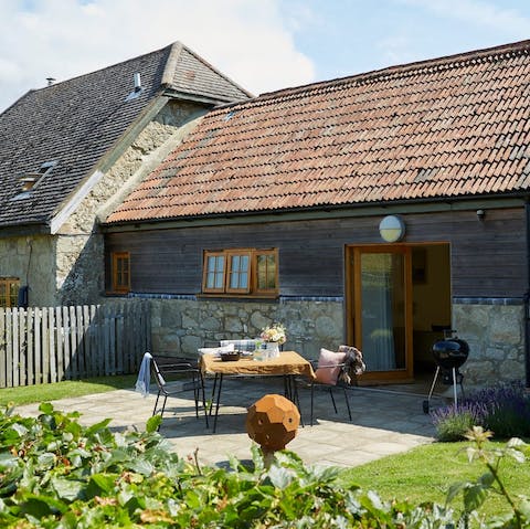 Take breakfast outside in the pretty, suntrap garden