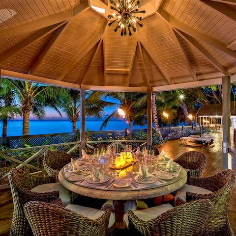 Dine alfresco with loved ones and drink in the sea vistas as the sun sets