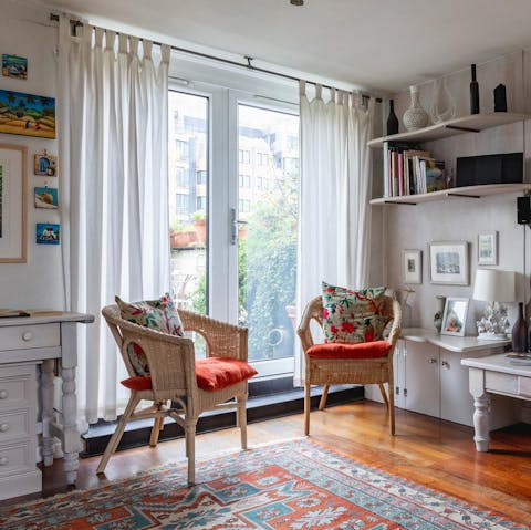 Make yourself at home in the shabby-chic living area