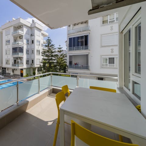 Enjoy an afternoon of nice, cold Efes and games of cards on your balcony, overlooking the pool