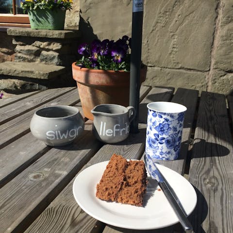 Treat yourself to tea and cake on the sunny patio