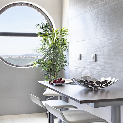 Share a meal or work from home around the table and take in the scenery from the porthole windows