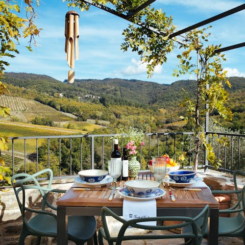 Feast on a chef-prepared dinner and admire the rolling views