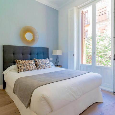 Open up the bedrooms' French doors and perch by the Juliet balconies overlooking Calle Mayor