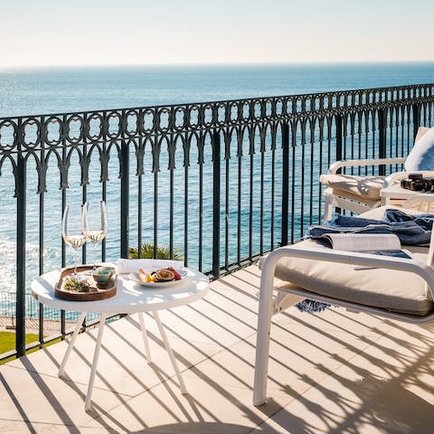 Take breakfast out on the balcony and wake up gradually to the sound of waves