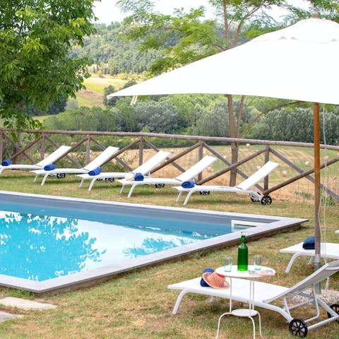 Cool off in the sparkling private pool, framed by breathtaking views