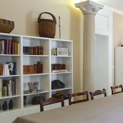 Books and interesting curios reflect the history of the house and the area