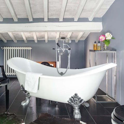 Sink into the luxurious clawfoot tub