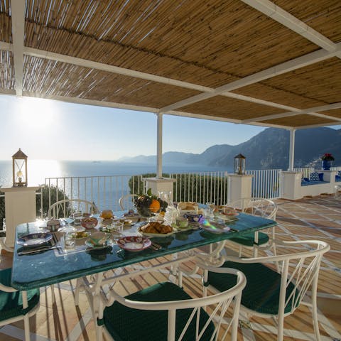 Enjoy alfresco dining with a glorious view of the Amalfi Coast