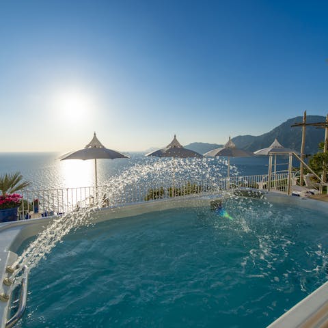 Relax with the pool's whirlpool jets – it's the place to be at sunset