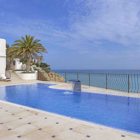 Cool off in your private pool, with views over the sea