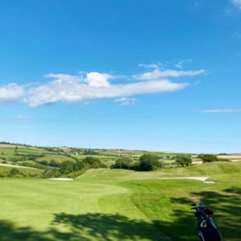 Squeeze in a round or three on the resort's championship golf course