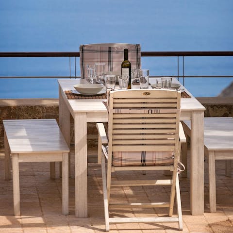 Set the table ready for an alfresco lunch in the sunshine