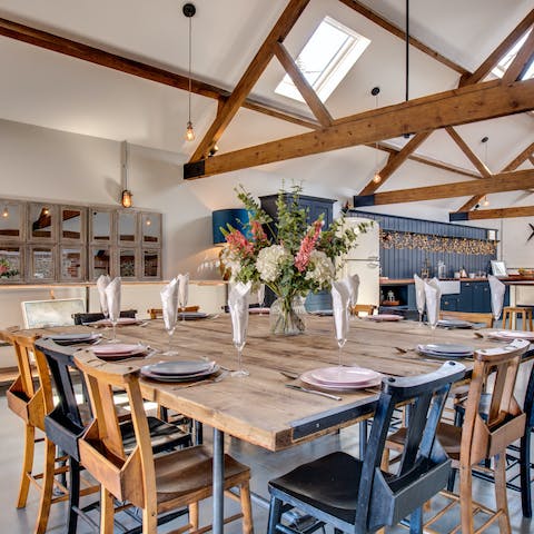 Gather the group at the rustic 12-seater dining table