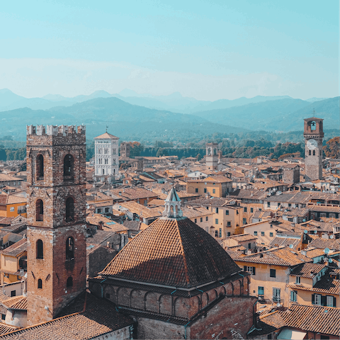 Walk the cobbles of history inside Lucca's walls – the Piazza dell'Anfiteatro is 900 metres away