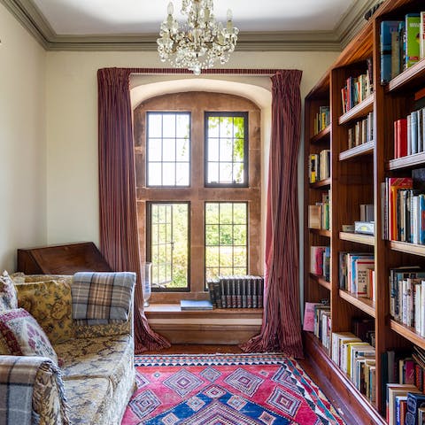 Grab a book and relax in the castle's cosy library