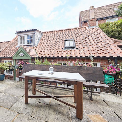 Dine alfresco on the terrace on a sunny evening