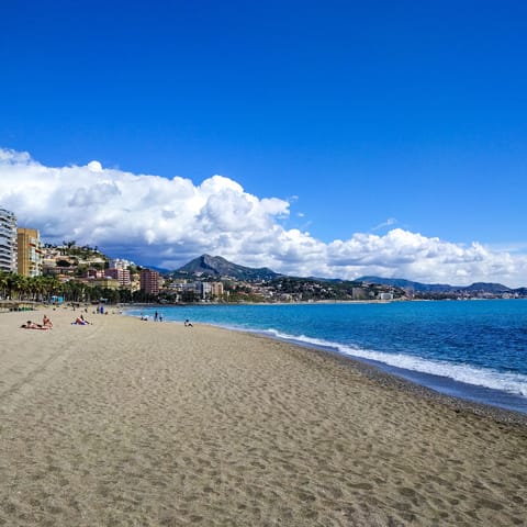 Head over to Malagueta Beach and relax on the sand