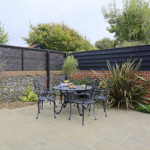 Eat outside in the pretty courtyard garden