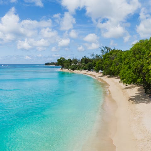 Step out of your front door and onto the white sands of Gibbes Beach