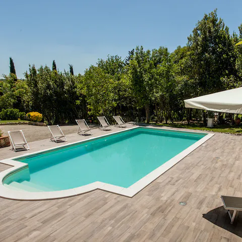 Slip into the Roman-style swimming pool in the heat of the day
