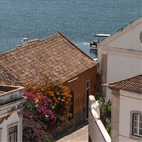 Stroll the pretty streets of Faro from this central location