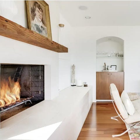 Light the fire in the living room for cosy evenings in