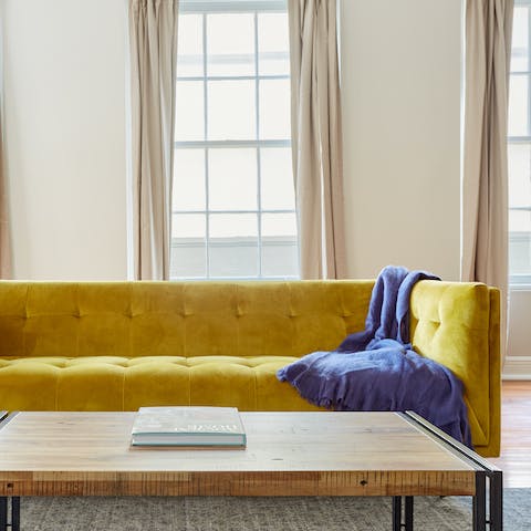 Admire mid-century stylish furniture in the sunny living room