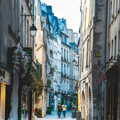 Stay in Marais, close to trendy cafes and art galleries