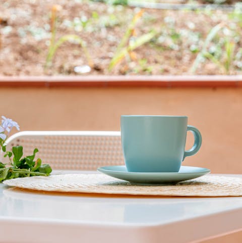 Savour a fresh cup of coffee on the secluded patio