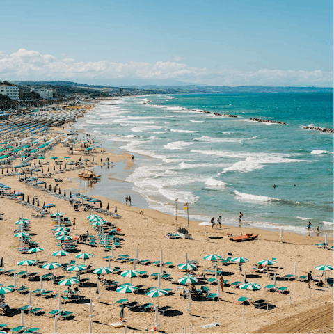 Visit the golden sands of Maurizio Beach and work on that perfect tan