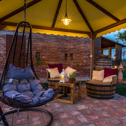 Spend balmy evenings chatting in the cosy outdoor nook area, sipping on local wine