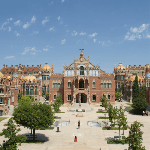 Get the metro for twenty-four minutes to Sant Pau Recinte Modernista and stroll around the old hospital 