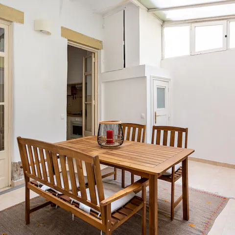 Enjoy a sunny breakfast in the covered courtyard area