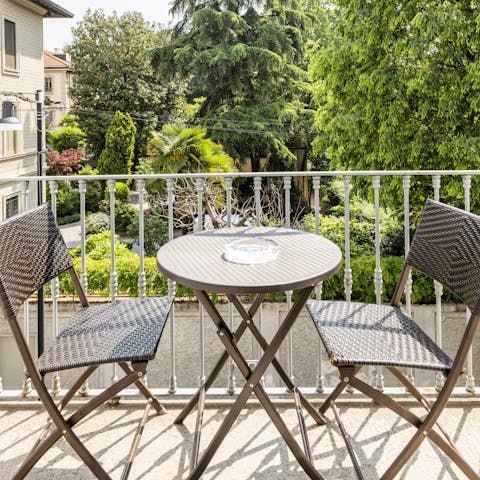 Admire garden views to the east and west from the balcony