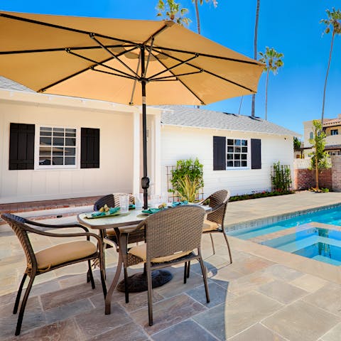 Prepare a meal on the barbecue to enjoy under the shade on your private terrace