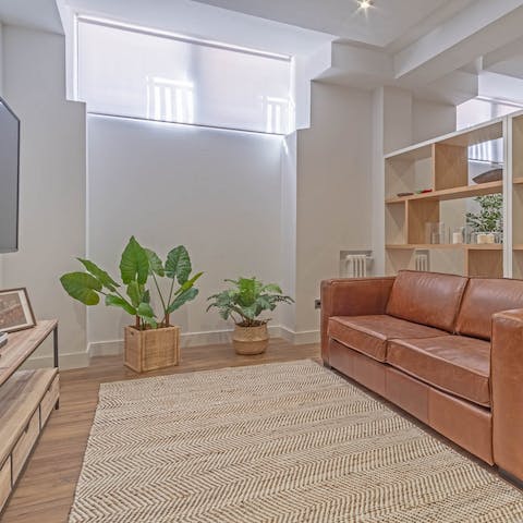 Sink into the comfy leather couch and watch a movie on the large TV