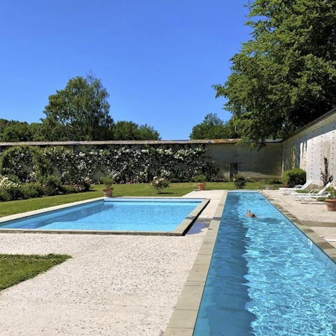 Do some lengths in the swimming pool under the Normandy sun