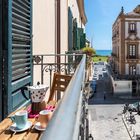 Spend your mornings enjoying your espresso on the private balcony