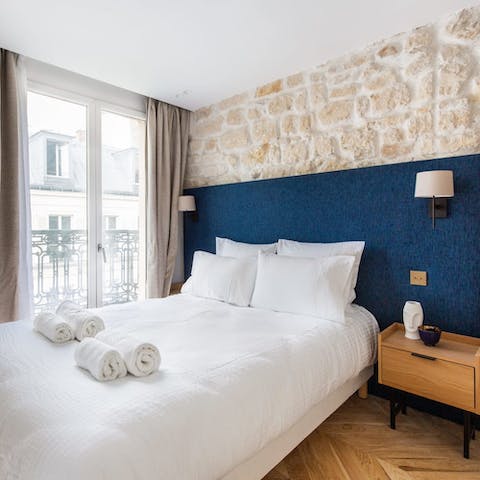 Wake up to charming scenes of the Parisian rooftops