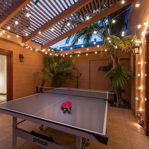 Play the dreamiest version of table tennis under fairy lights
