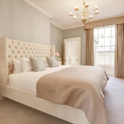 Sleep soundly surrounded by the soothing decor of the master bedroom