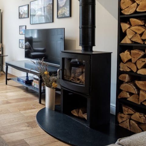 Put some logs in the wood-burning fireplace and get toasty during the cooler months